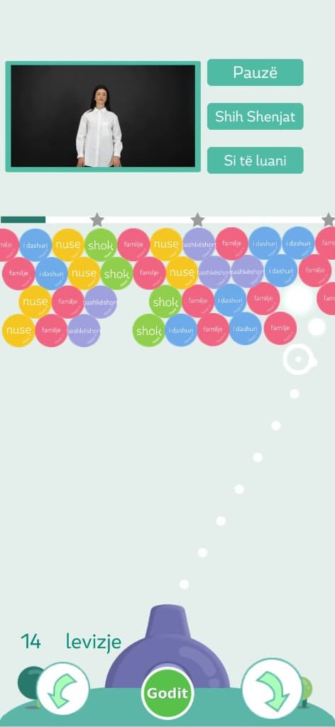 Popsign gameplay with curved shot trajectory